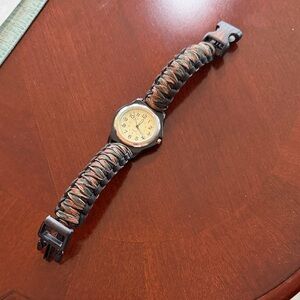 Watch with camouflage paracord band